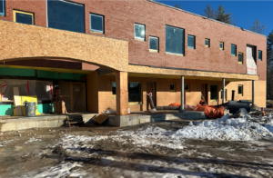 Photo of the front of the new Hight Family early childhood wing at the Margaret Chase Smith Community School under construction.